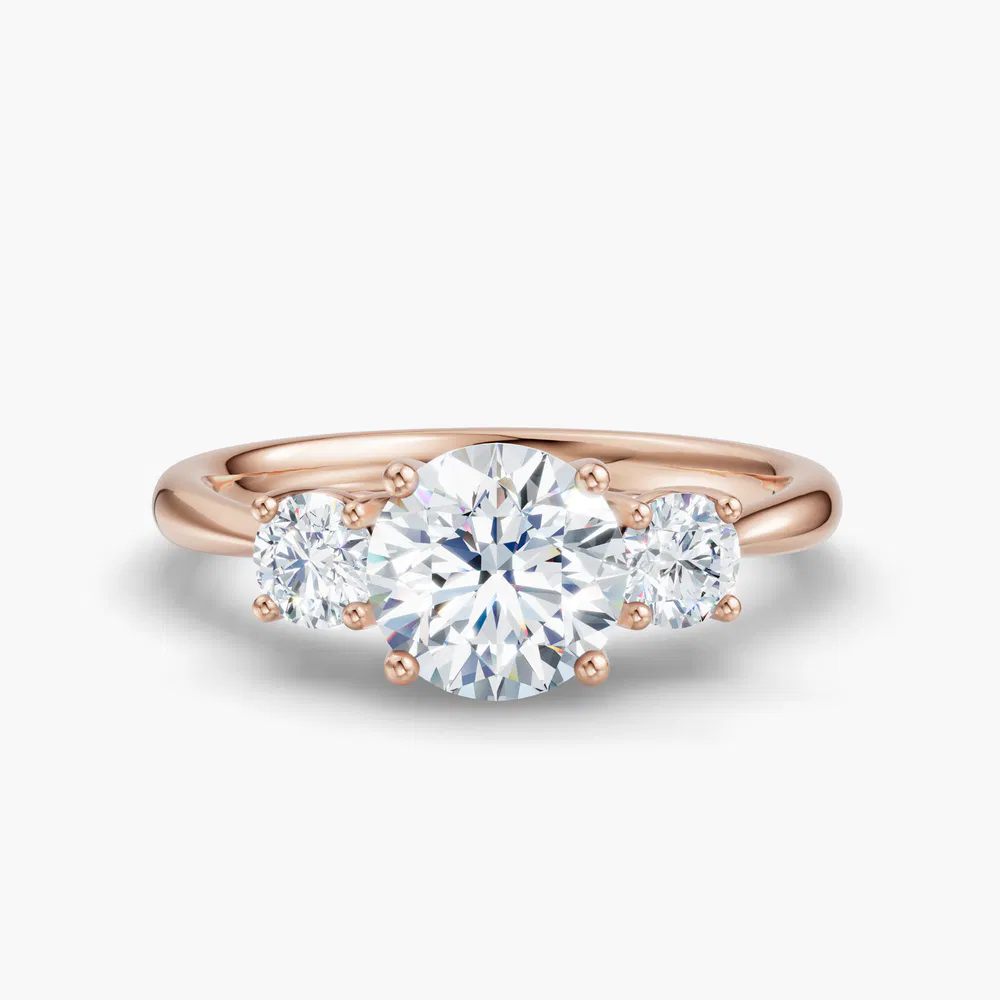 Dhyra 1 carat Lab Grown Diamond Round Cut Side Stone, Three Stone, Low profile Engagement Ring in 18K Rose Gold